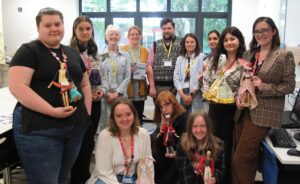 The Telford College art and design students with their competition entries